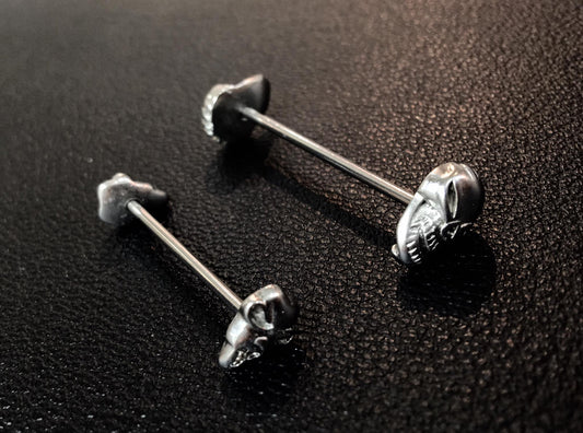 Industrial piercing in surgical steel skull model